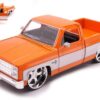 JADA TOYS JADA33612 CHEVROLET C-10 PICK UP 1985 ORANGE/GREY 1:24 Modellino